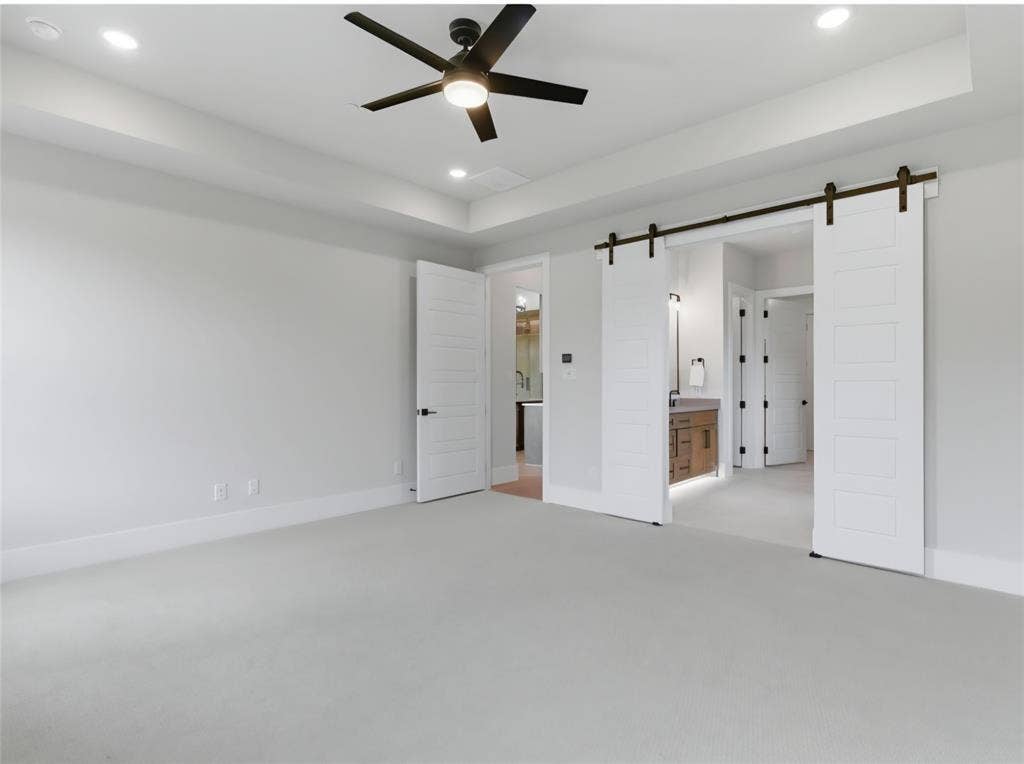 2608 Southbay, Northlake, TX 76226 Coffer ceiling with recessed lighting and a ceiling fan