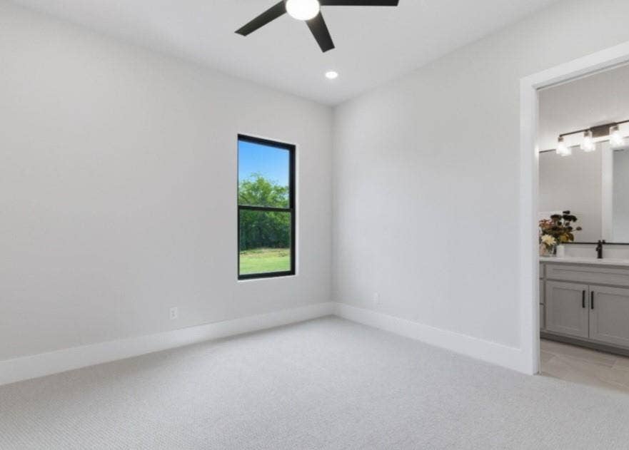 2608 Southbay, Northlake, TX 76226 Carpeted room with a black ceiling fan, recessed lighting, and a window
