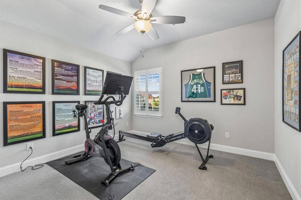 7342 Shoestring Drive, Frisco, TX 75036 Versatile upstairs bedroom currently used as a home gym, offering endless possibilities to fit your lifestyle.