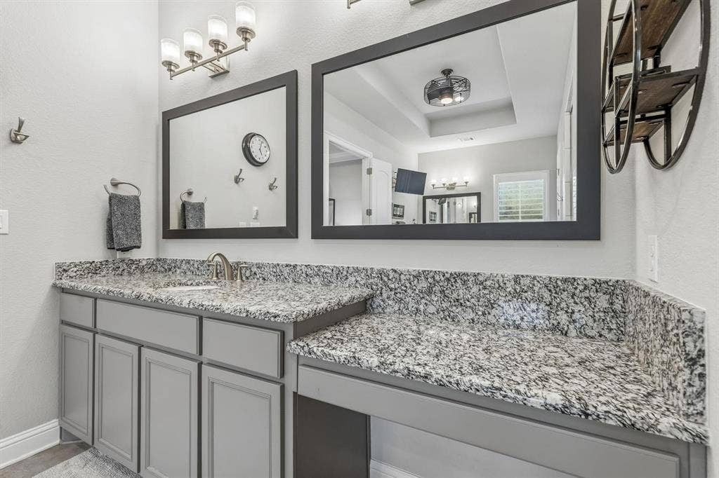 7342 Shoestring Drive, Frisco, TX 75036 Built-in vanity with ample countertop space creates the perfect spot to get ready each day.