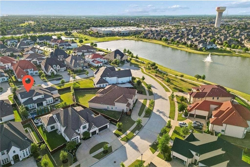 7342 Shoestring Drive, Frisco, TX 75036 Aerial ViewEnjoy the best of Phillips Creek Ranch with scenic ponds and miles of walking and biking trails just steps from your front door.