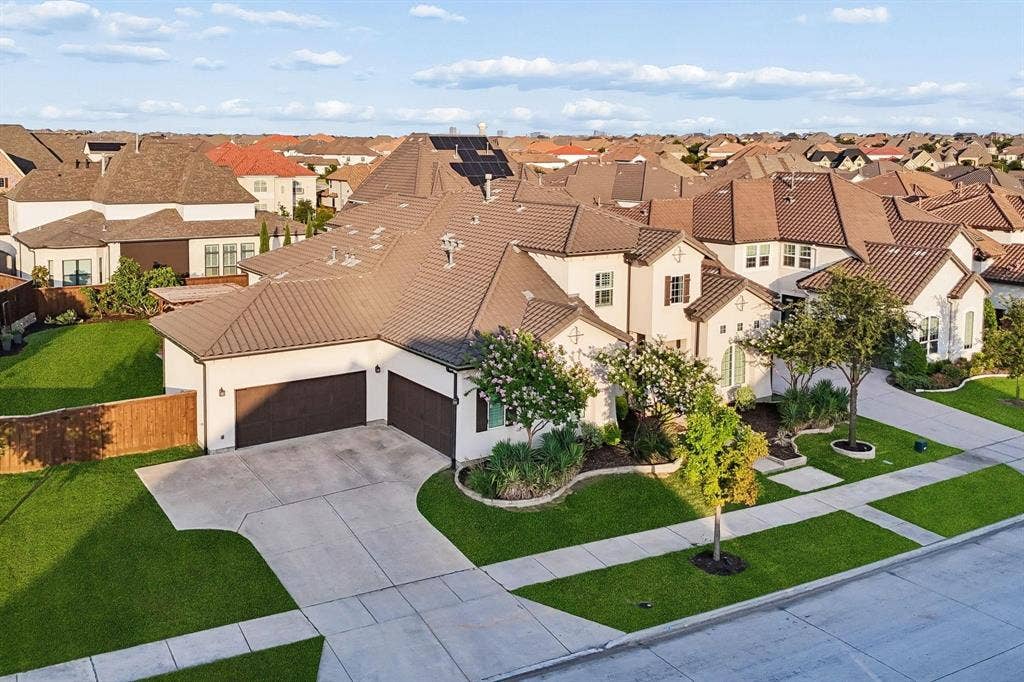 7342 Shoestring Drive, Frisco, TX 75036 Car garage. Space for 4 cars and a golf cart or work space