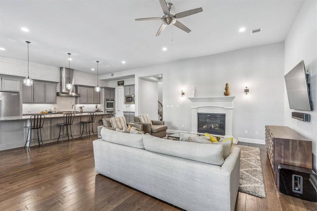 7342 Shoestring Drive, Frisco, TX 75036 The open-concept design creates a seamless flow between the kitchen, dining, and living areas perfect for everyday living and entertaining.