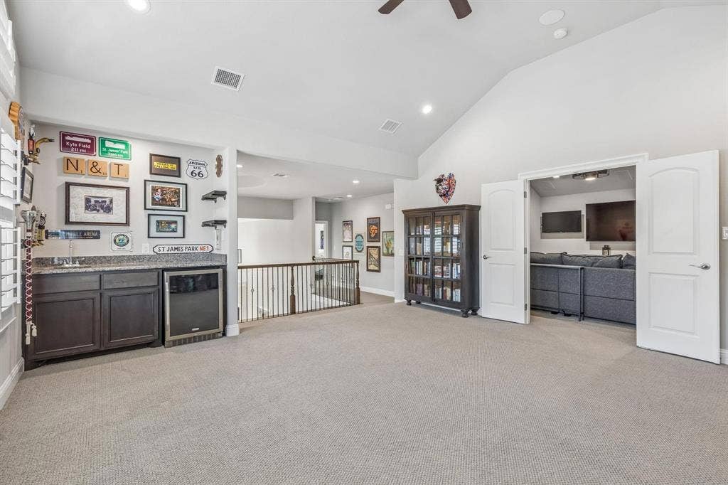 7342 Shoestring Drive, Frisco, TX 75036 Game room with bar off of the media room