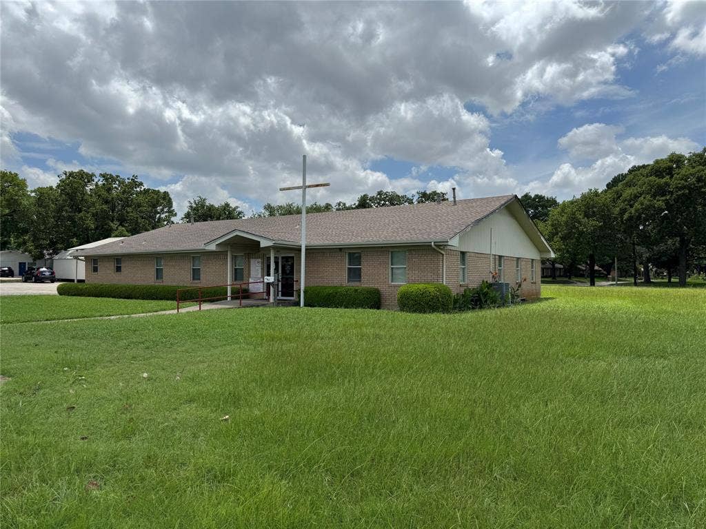 2801 Elm Street, Denton, TX 76201 Brick exterior with a gabled roof and a covered entry