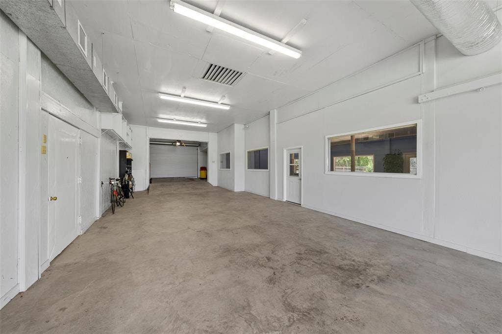 2029 Speegleville Road, Woodway, TX 76712 Concrete flooring, fluorescent lighting, internal windows, internal door, and a roll-up door