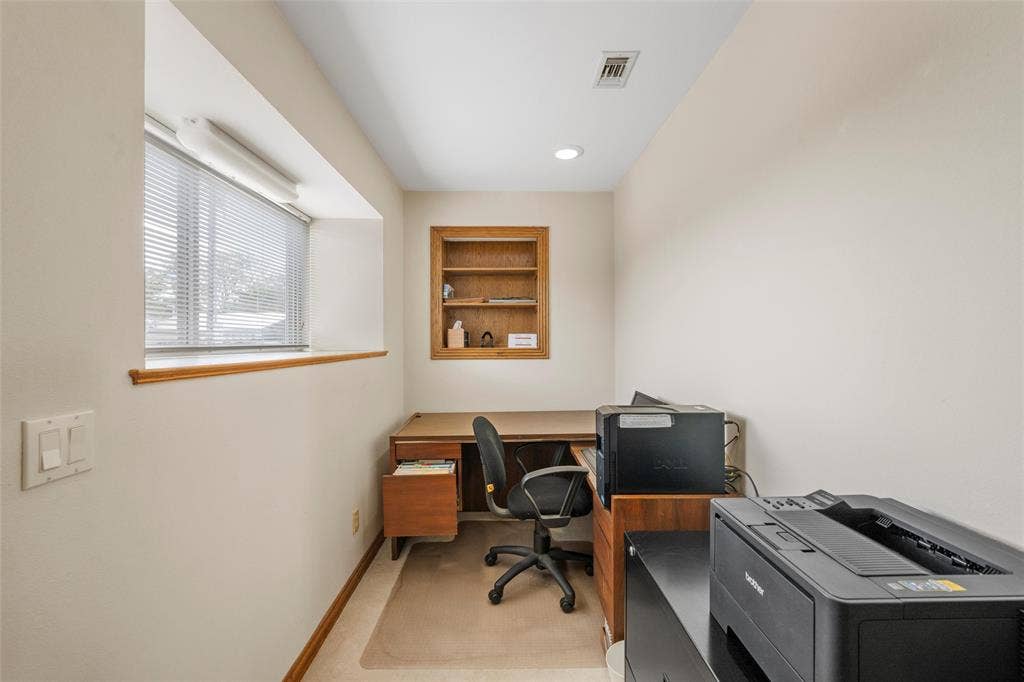 2029 Speegleville Road, Woodway, TX 76712 Recessed lighting, wood-finish window trim, built-in shelving, and light-toned walls