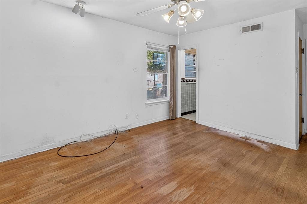 2024 Blake Avenue, Dallas, TX 75228 Wood-finish flooring with a ceiling fan light fixture and recessed ceiling light