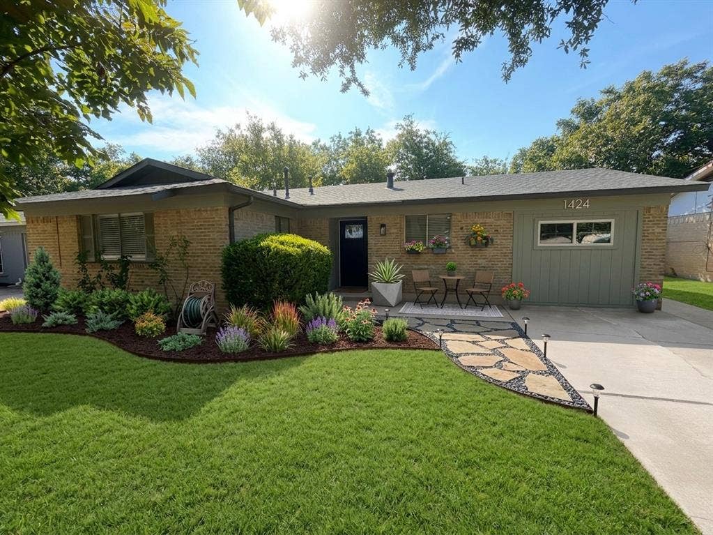 1424 E Parker Road, Plano, TX 75074 Brick exterior with a gray composition shingle roof
