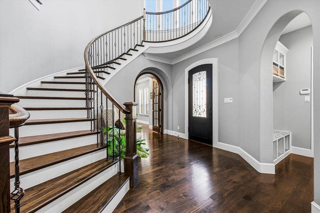Sweeping wood staircase