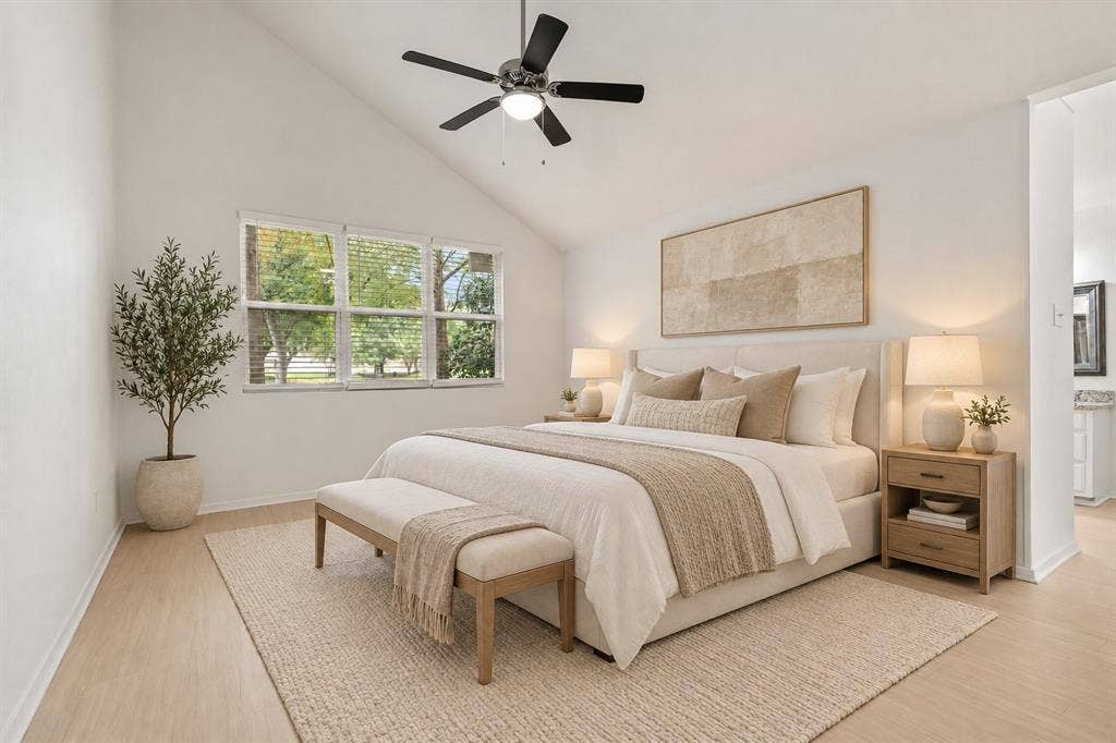 2713 Belmeade Drive, Carrollton, TX 75006 Primary bedroom with vaulted ceiling. Virtually staged.
