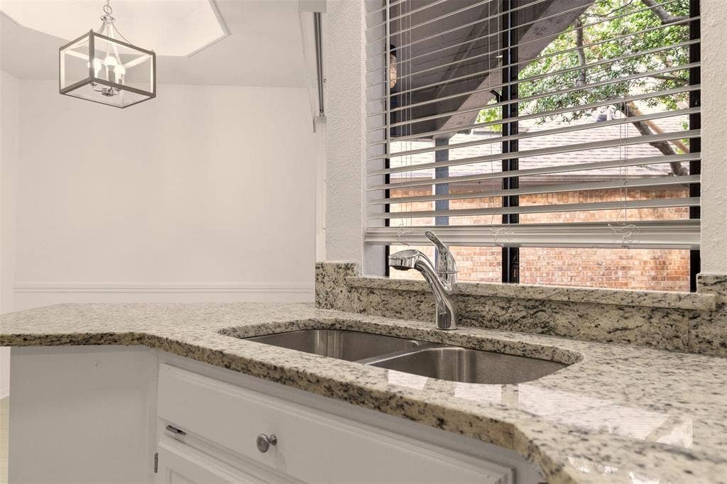 2713 Belmeade Drive, Carrollton, TX 75006 Undermount sink under a window.