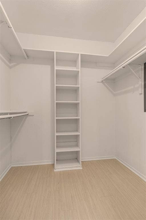 2713 Belmeade Drive, Carrollton, TX 75006 Walk-in closet with built-in shelves off the second bath.