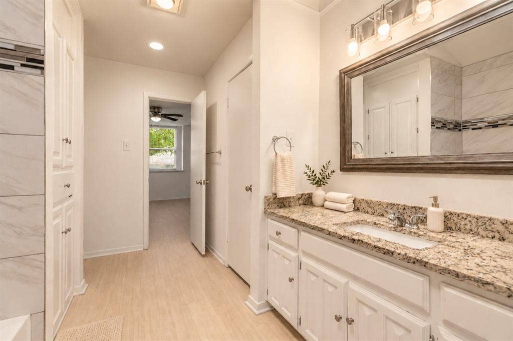 2713 Belmeade Drive, Carrollton, TX 75006 Second bath. Virtually staged.