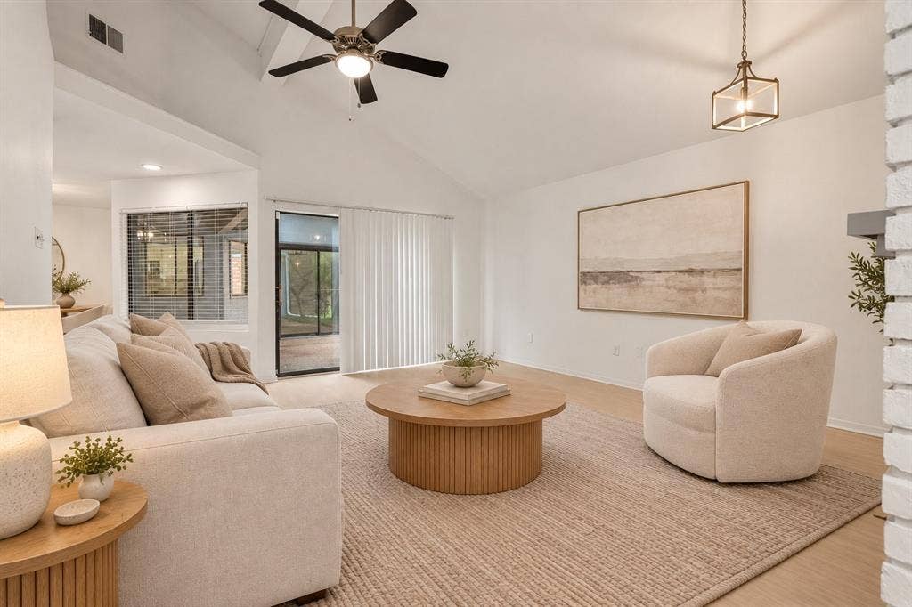 2713 Belmeade Drive, Carrollton, TX 75006 Living room. Virtually staged.