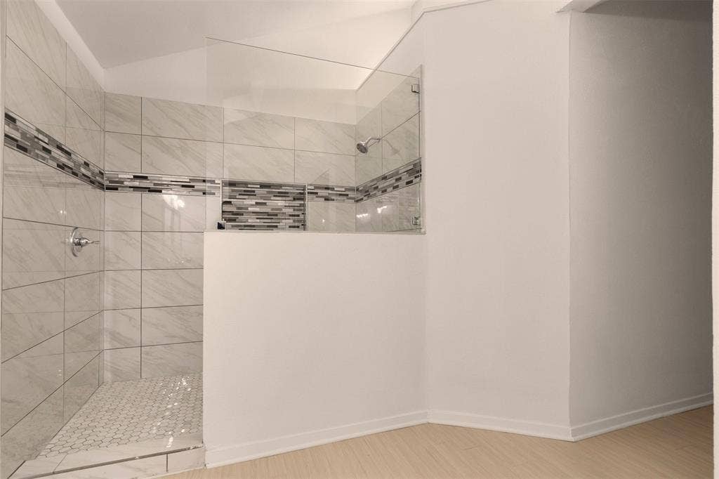 2713 Belmeade Drive, Carrollton, TX 75006 Walk-in tile shower.