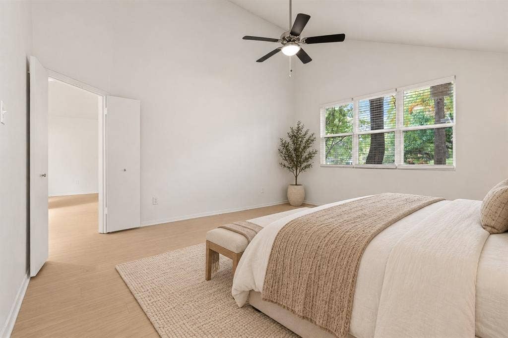 2713 Belmeade Drive, Carrollton, TX 75006 Primary bedroom. Virtually staged.