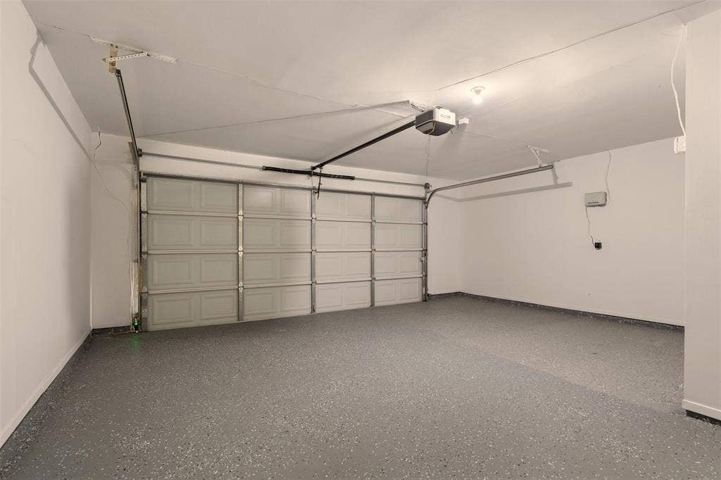 2713 Belmeade Drive, Carrollton, TX 75006 Two-car garage.