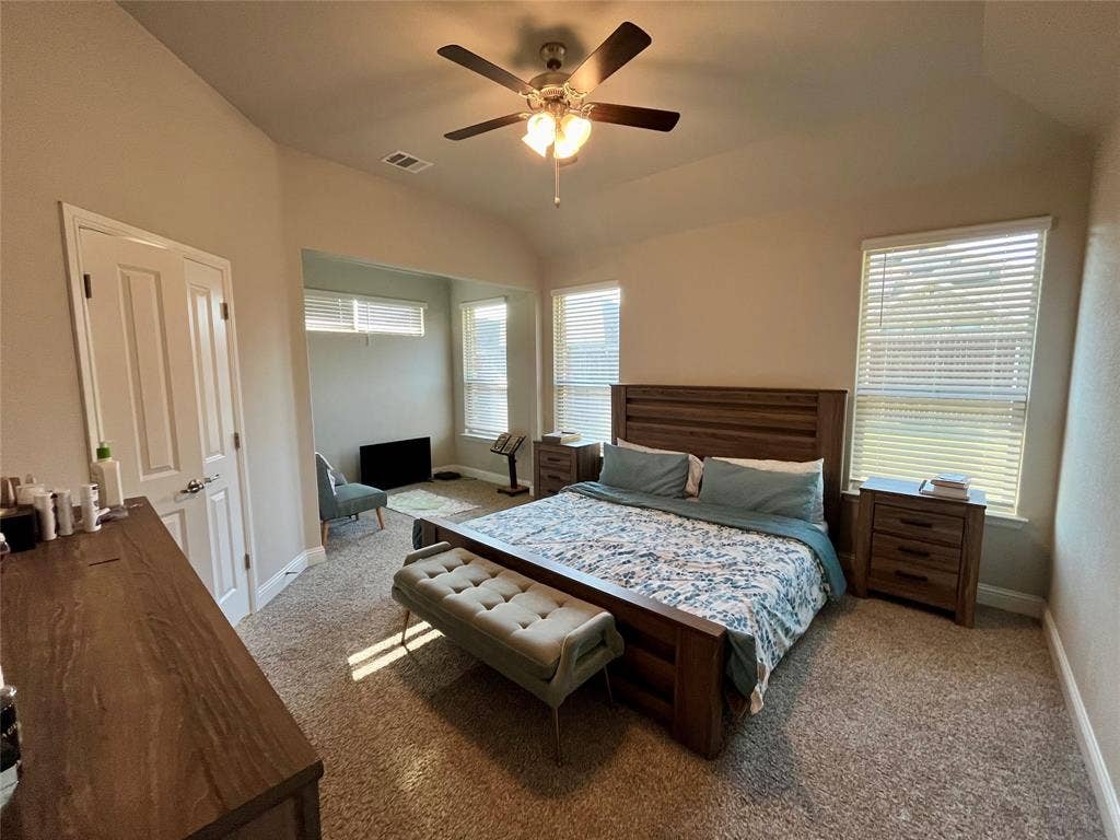 3636 Wintergreen Street, Grand Prairie, TX 76065 Room features vaulted ceilings, a ceiling fan with integrated lighting, and carpet flooring