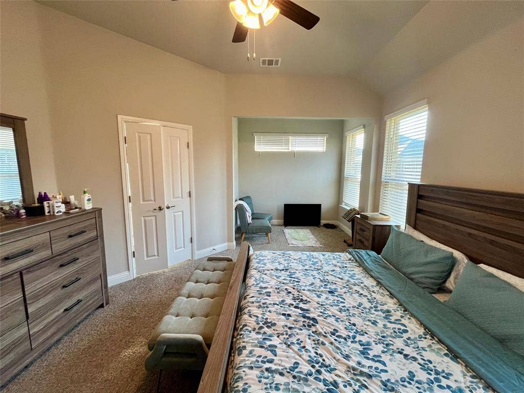 3636 Wintergreen Street, Grand Prairie, TX 76065 Large master with Recessed alcove with multiple windows, vaulted ceiling, and ceiling fan with integrated lighting
