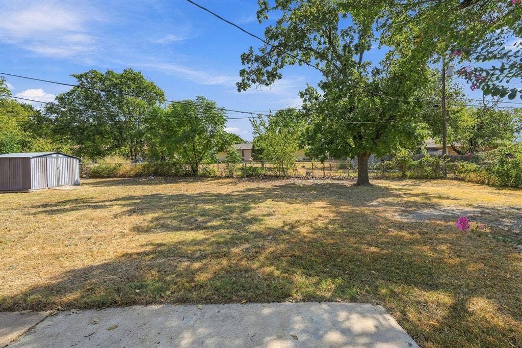 1404 Hillside Drive, Midlothian, TX 76065 HUGE fenced in backyard with patio, mature trees and shed