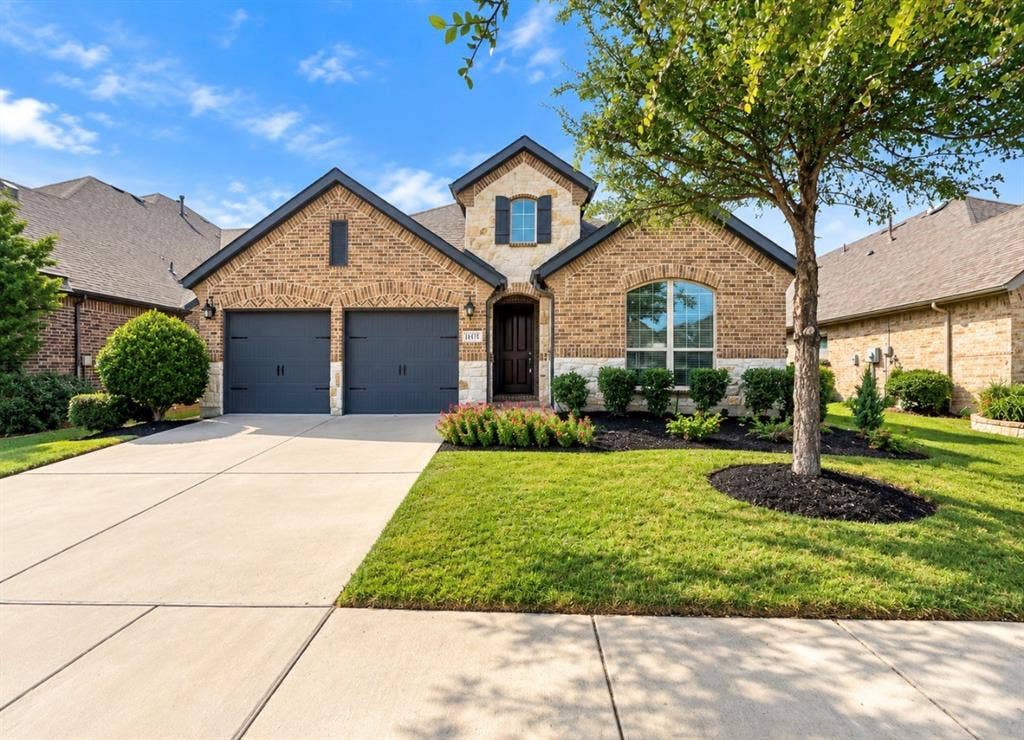 16116 Plum Court, Prosper, TX 75078 Brick and stone exterior with dark trim