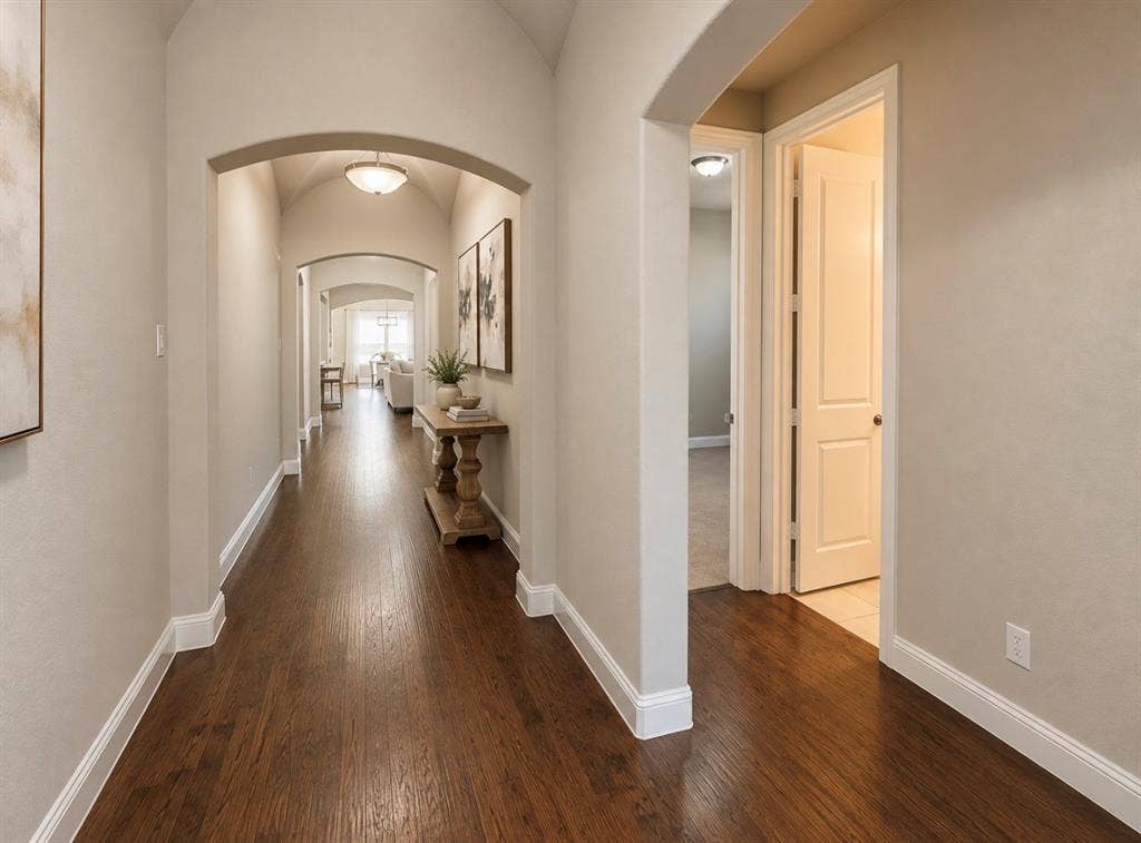 16116 Plum Court, Prosper, TX 75078 Archway entry with wood-finish flooring, recessed ceiling lighting, and panel interior doors
