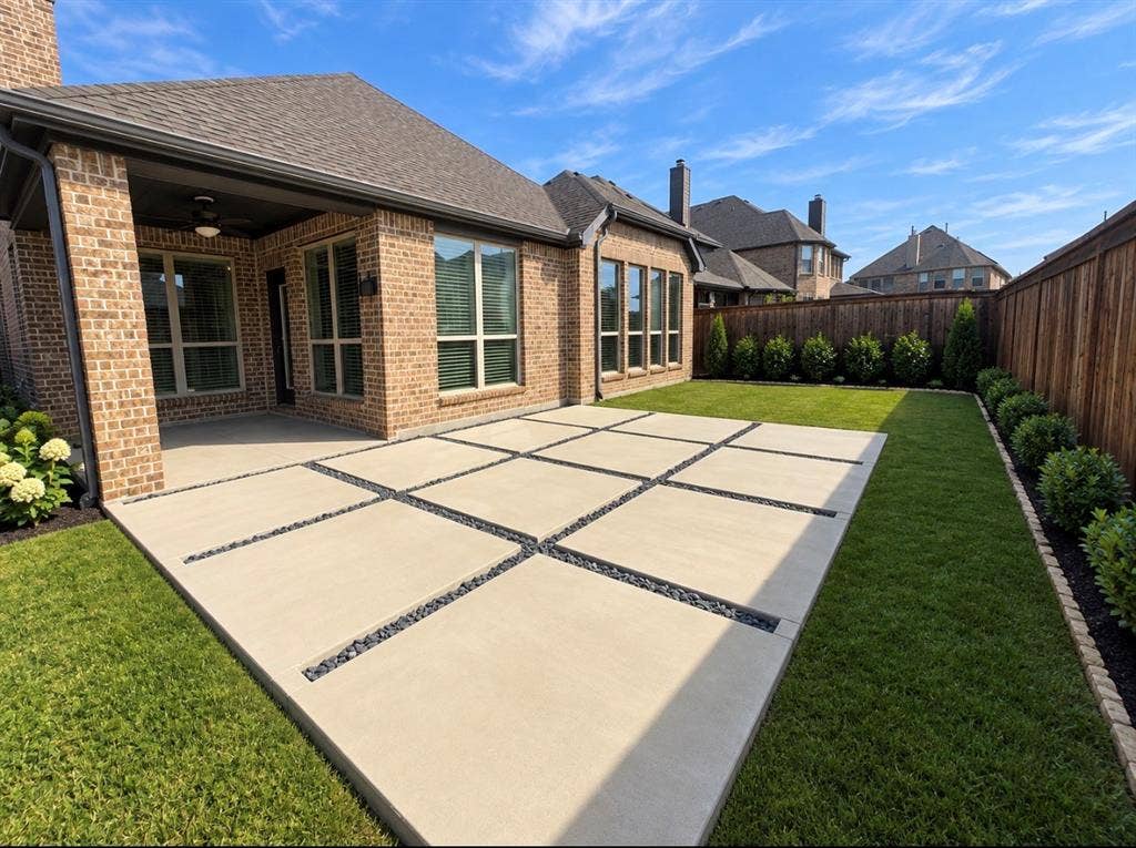 16116 Plum Court, Prosper, TX 75078 Expansive backyard featuring a manicured lawn, a large paver patio with decorative stone accents, a covered patio with a ceiling fan, and privacy fencing