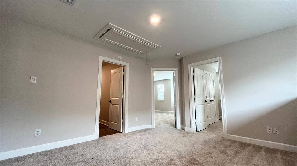 1101 Princeton Heights, Princeton, TX 75407 Carpeted flooring throughout, neutral wall paint, white trim, and recessed lighting