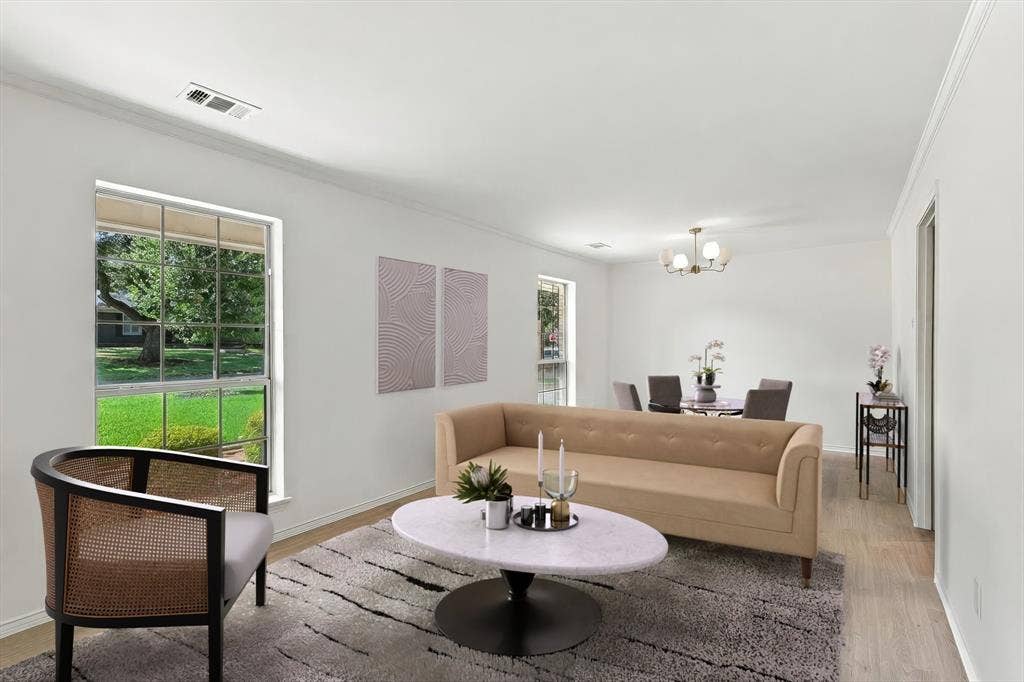 2811 Reedcroft Drive, Farmers Branch, TX 75234 Recessed lighting, crown molding, wood-finish flooring, and a contemporary chandelier