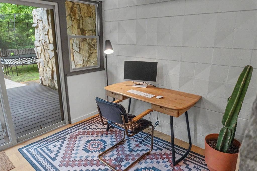 11737 Rogue Way, Dallas, TX 75218 Office nook on the lower level with sliders out to the patio