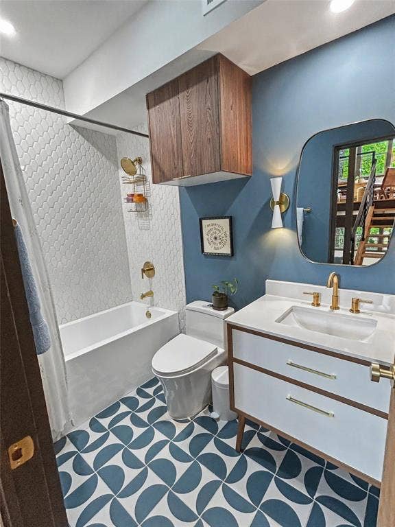 11737 Rogue Way, Dallas, TX 75218 Guest bathroom with designer tile on the entry level