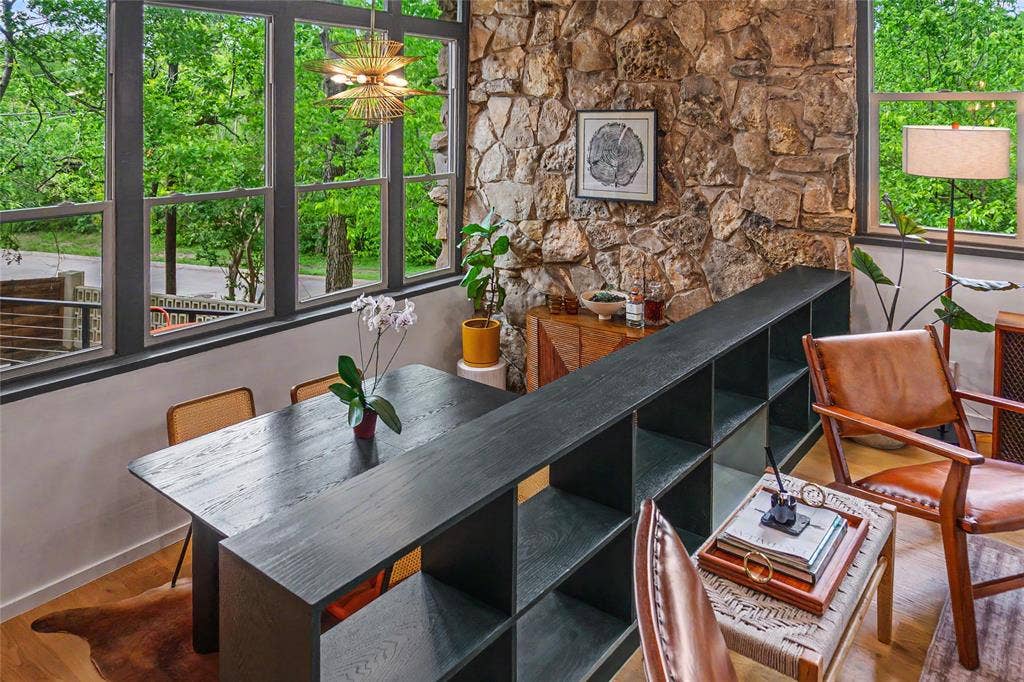 11737 Rogue Way, Dallas, TX 75218 Open shelving divides dining and living without closing either off with lovely views of the greenbelt
