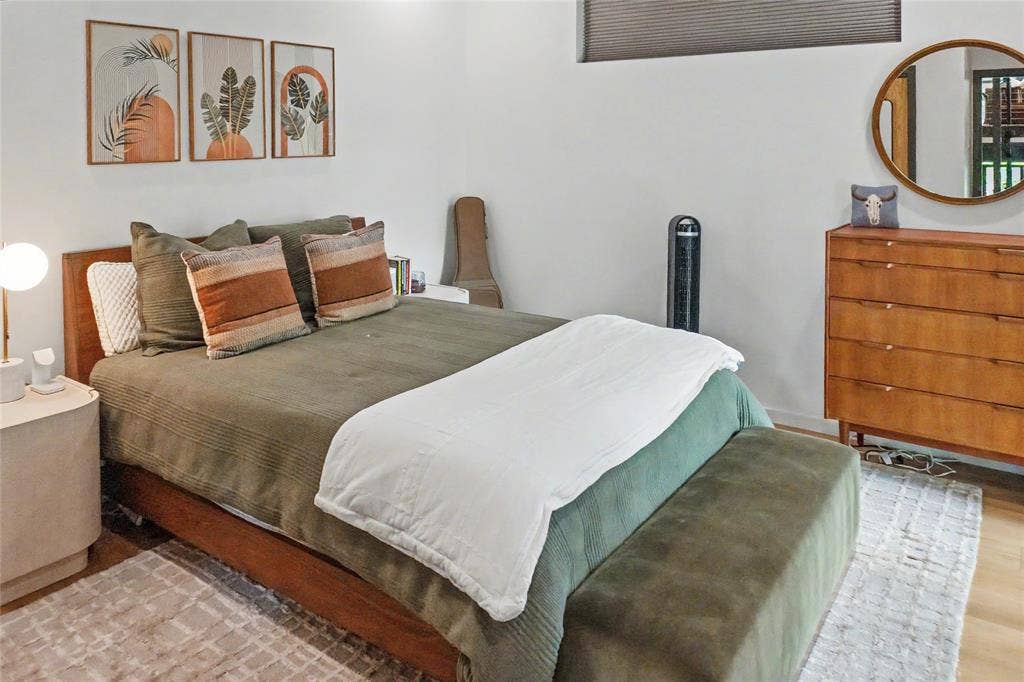 11737 Rogue Way, Dallas, TX 75218 Primary bedroom with en suite bath on the entry level