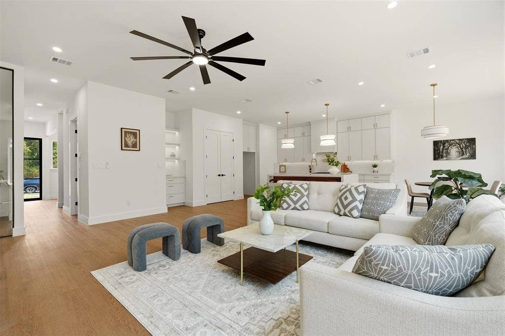 6911 Mohawk, Dallas, TX 75235 Open concept living space with recessed lighting, wood-finish flooring, and a modern ceiling fan
