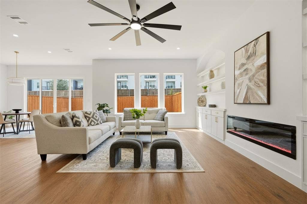 6911 Mohawk, Dallas, TX 75235 Wood-finish flooring, recessed lighting, and a modern ceiling fan