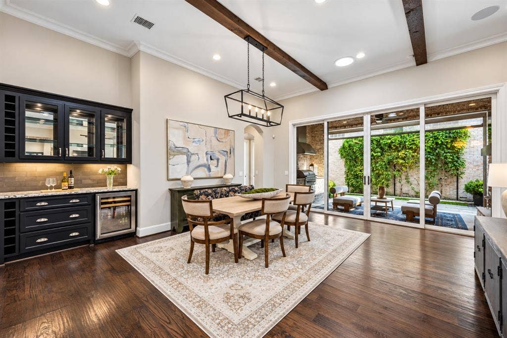 6816 Cousteau Court, Plano, TX 75024 Wood-finish flooring with exposed ceiling beams and recessed lighting