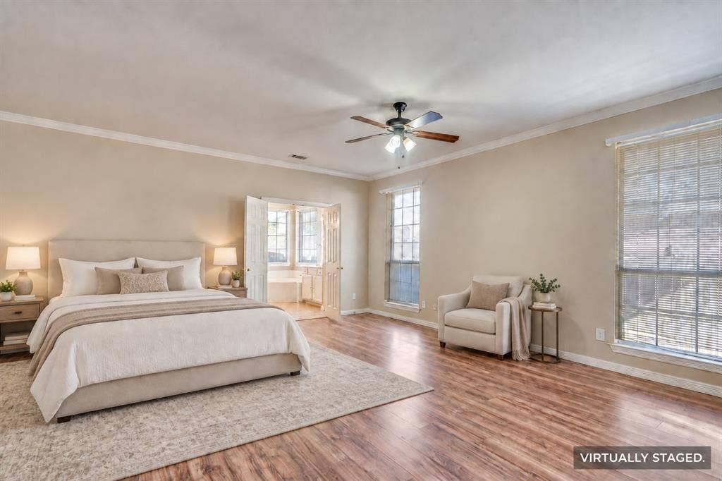 2305 Pittner Lane, Plano, TX 75025 Wood-finish flooring, ceiling fan, and crown molding