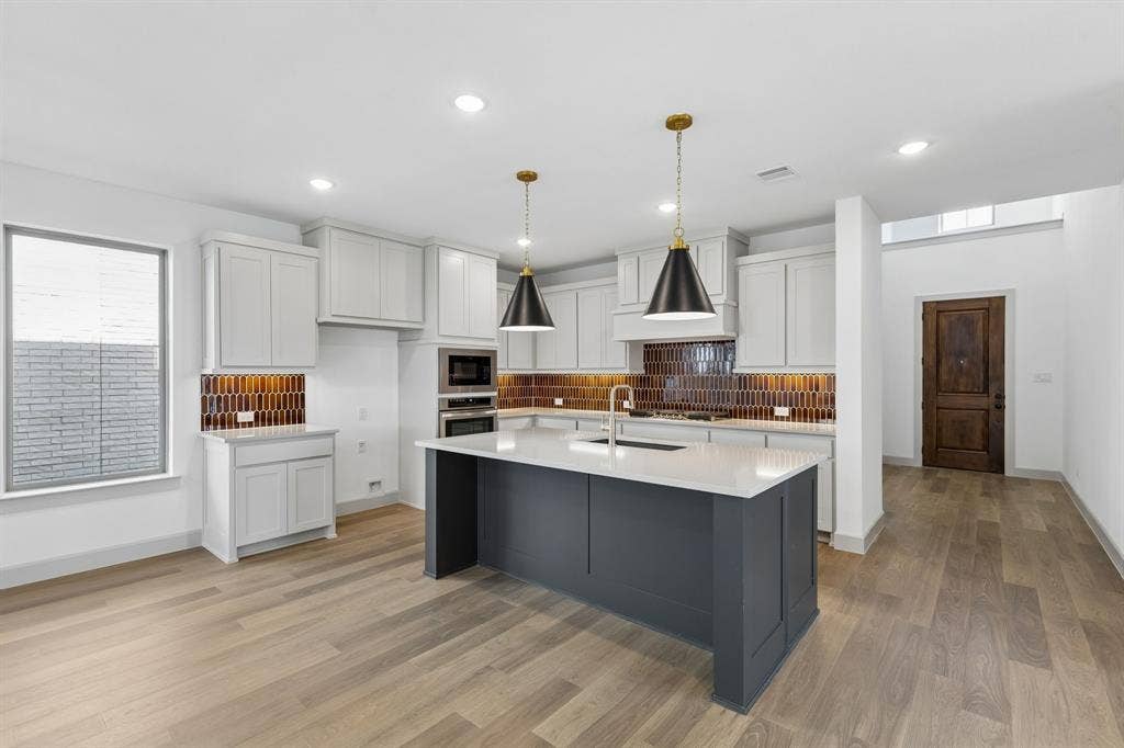 2612 Radiant Way, Celina, TX 75009 This striking kitchen is waiting for you to call it your own!