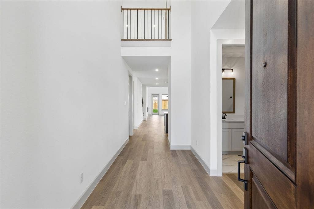 2612 Radiant Way, Celina, TX 75009 With sight lines from the front through to the rear of the home and ample space to display art work, our Toulouse II plan offers the perfect place for you to welcome friends and family into your dream home!