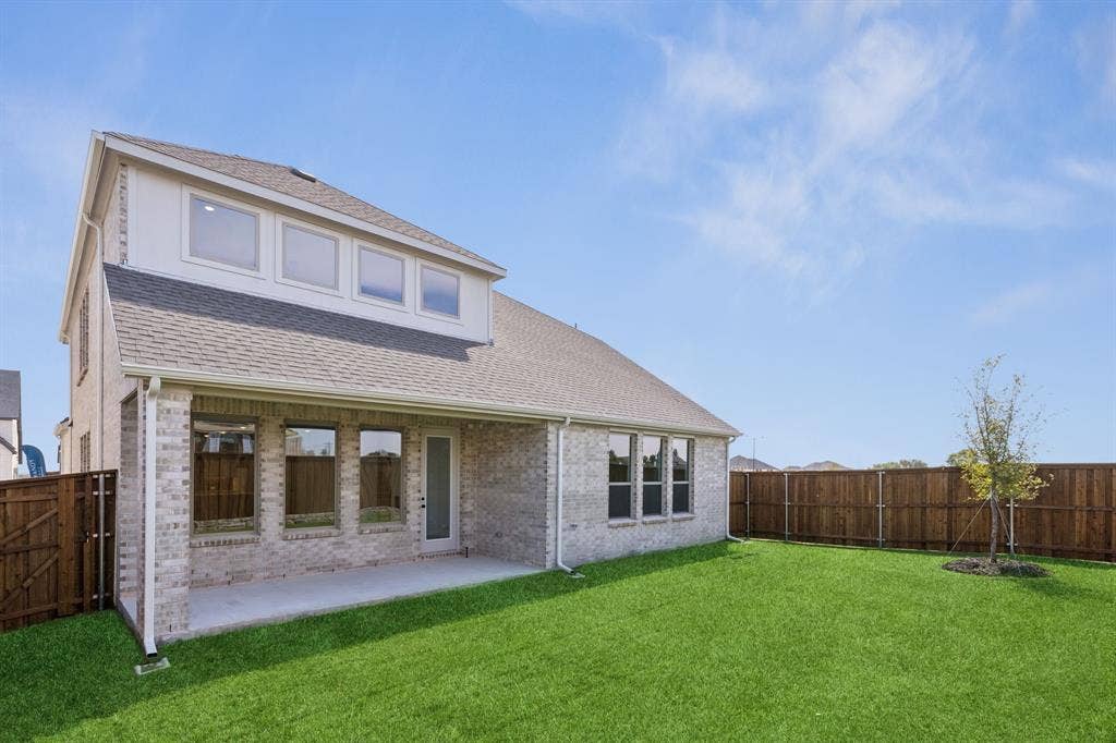 2612 Radiant Way, Celina, TX 75009 The entire family will enjoy never ending outdoor fun times in this lovely fenced back yard with covered patio!