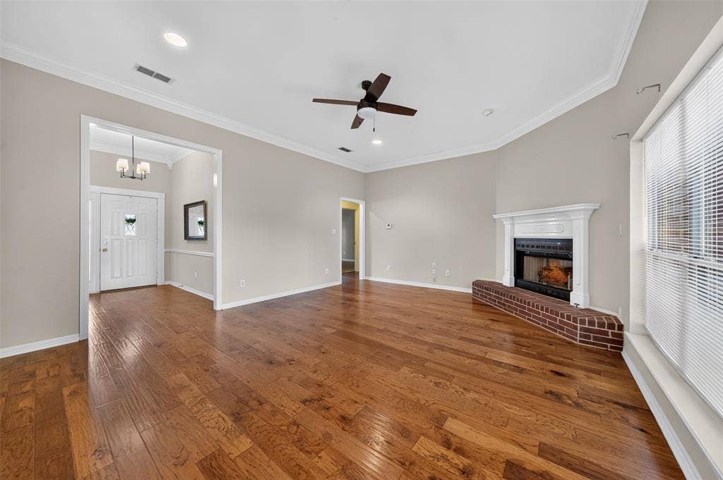 202 Northcreek Drive, Chandler, TX 75758 View from the kitchen looking back through the Living area. (Fire in fireplace is staged)