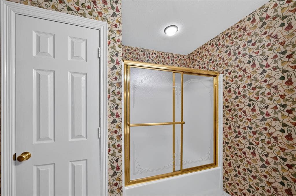 202 Northcreek Drive, Chandler, TX 75758 View of the Closet and Bathing area of the second Bathroom.