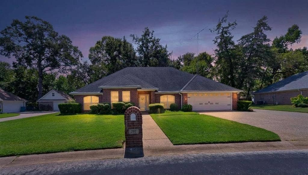 202 Northcreek Drive, Chandler, TX 75758 Staged Night Photo of Street View