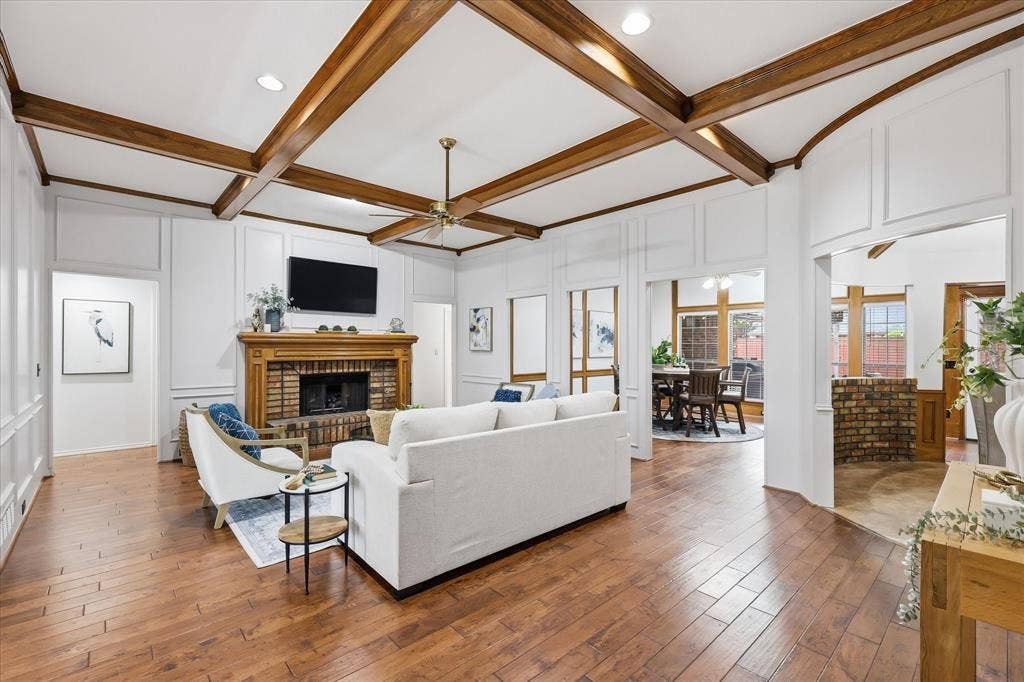 1516 Glastonbury Drive, Plano, TX 75075 beamed ceilings and cozy fireplace