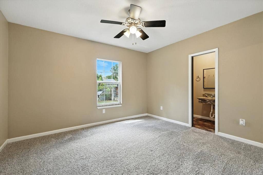 7243 Ash Street, Frisco, TX 75034 Primary bedroom at back of home with ensuite bath.