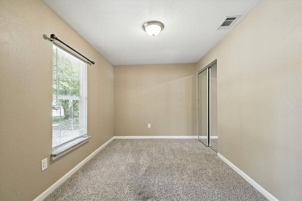 7243 Ash Street, Frisco, TX 75034 Secondary bedroom with view out the front of the home