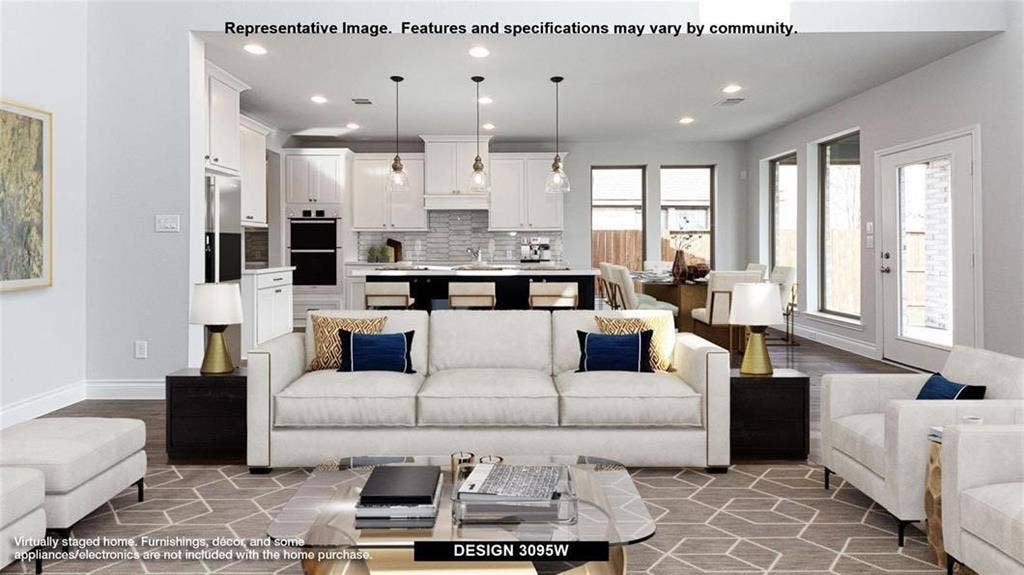 4237 Capstone Road, Midlothian, TX 76065 White cabinetry, recessed lighting, double wall ovens, clear glass pendant lighting, and an exterior patio door