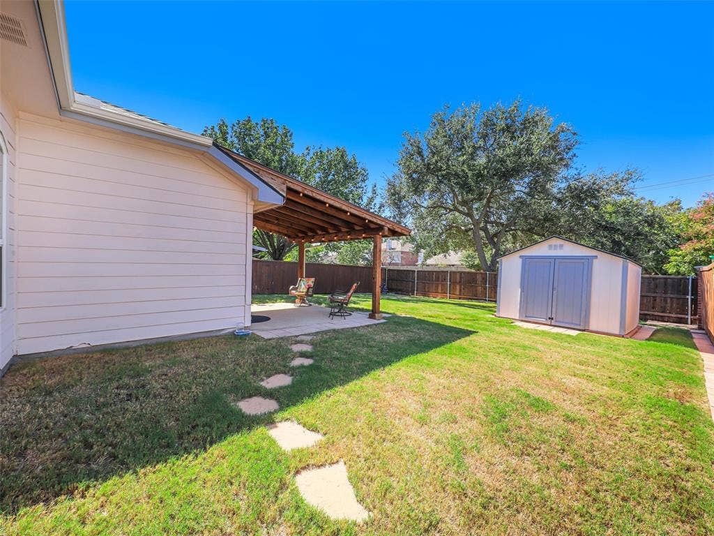 2109 Lilac Circle, McKinney, TX 75071 Storage shed provides room for all your lawn and gardening needs