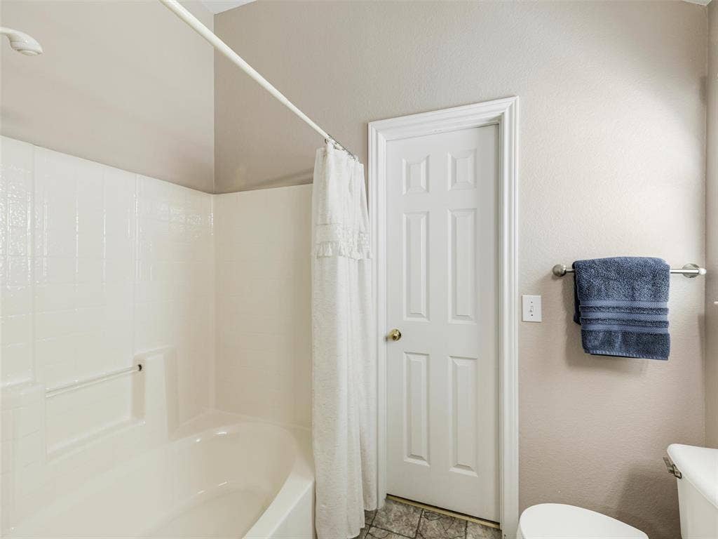 2109 Lilac Circle, McKinney, TX 75071 Garden tub with shower head and access to large walk in closet